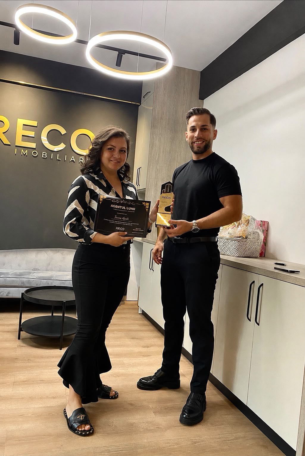 Joanna receiving the Agent of the Month award