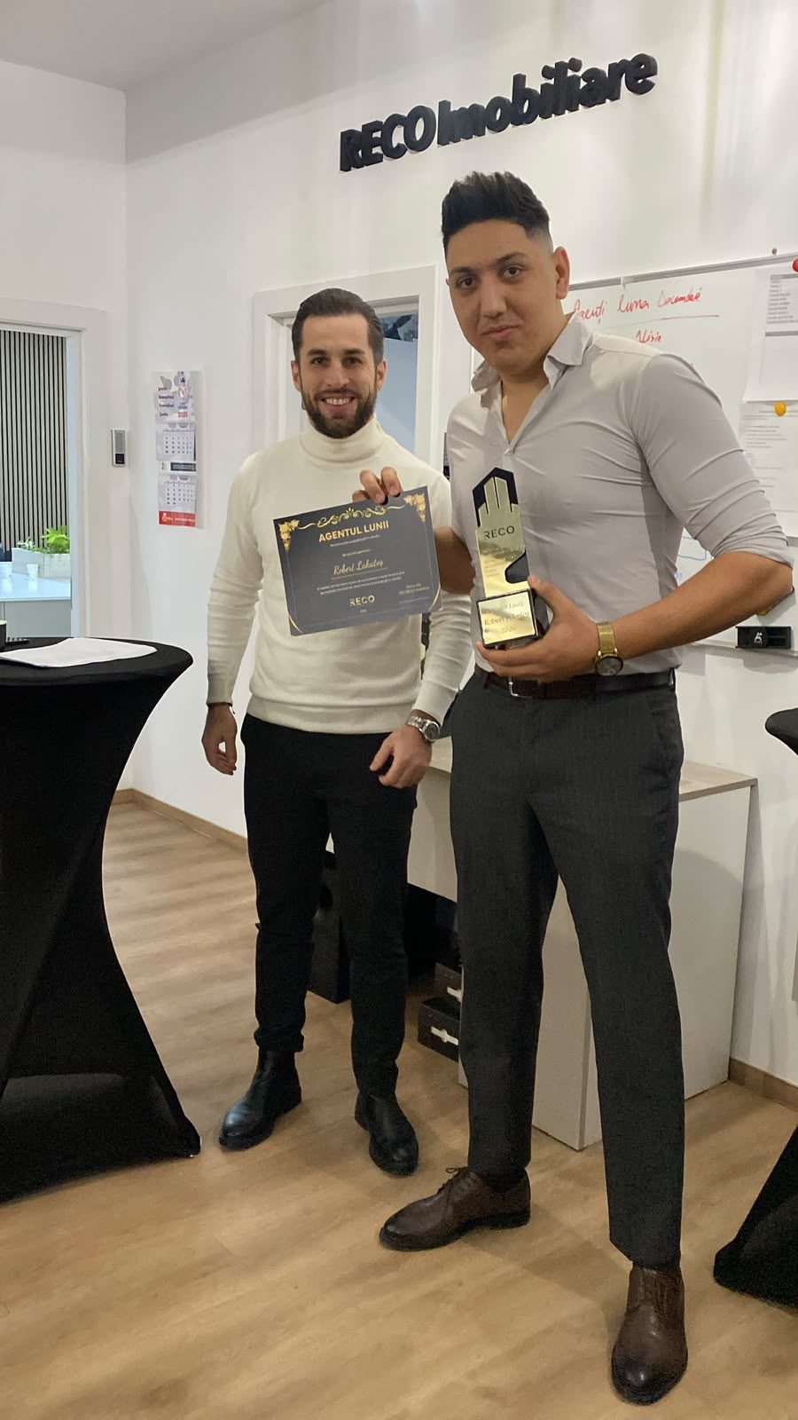 Robert receiving the Agent of the Month award